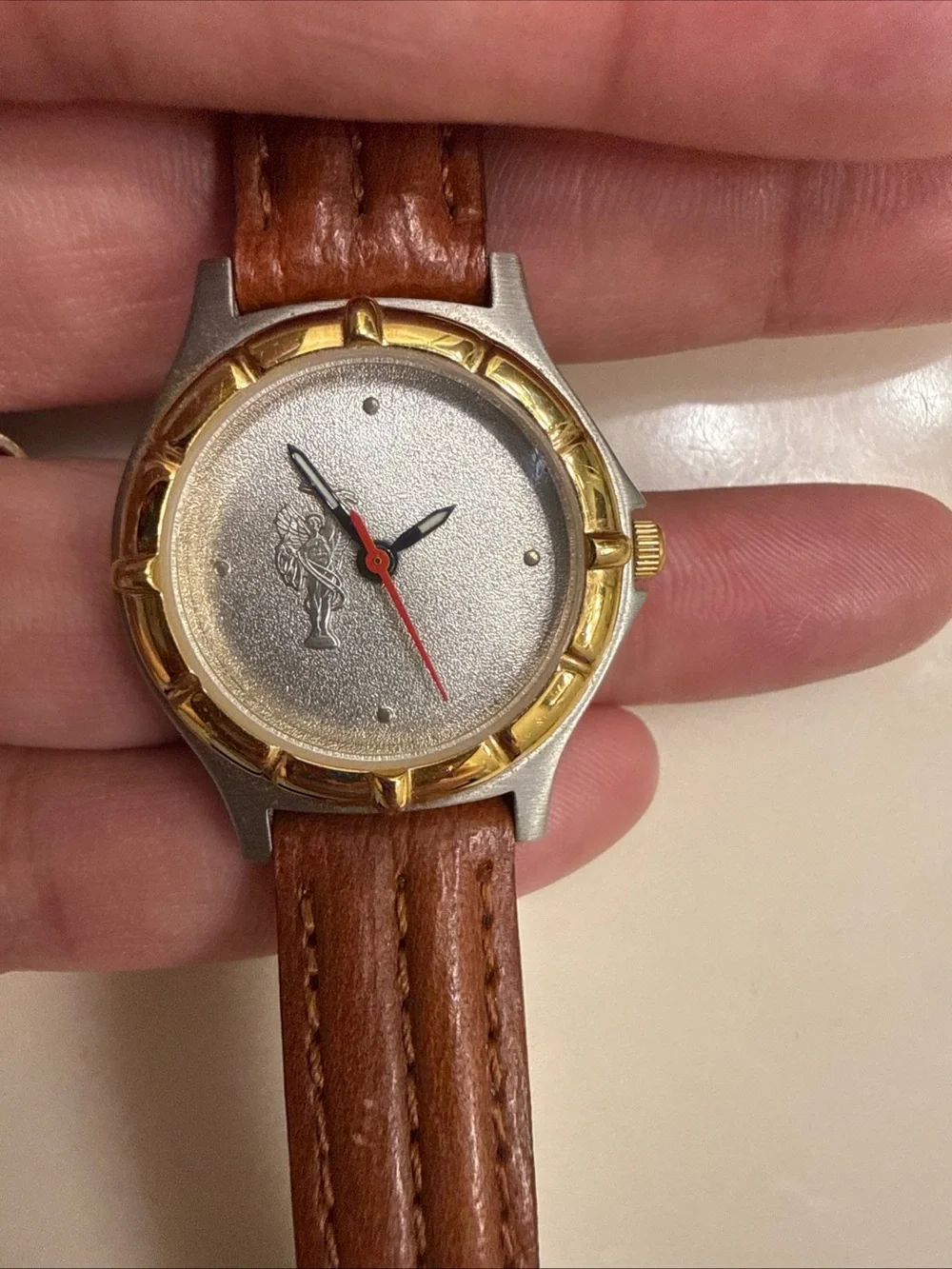 Brown Leather-Strap Watch with Gold-Bezel Accent need battery